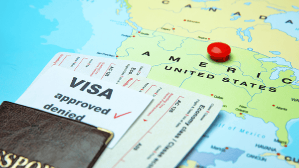 A close-up photograph of a passport and a 221(g) administrative processing and visa, symbolizing a Mandamus lawsuit for 221(g) administrative processing.